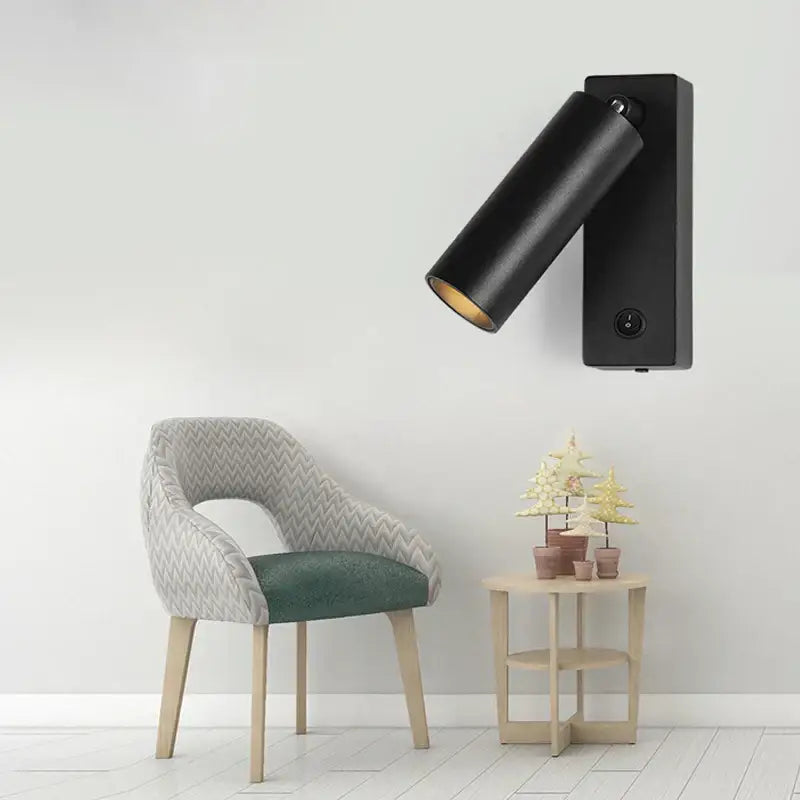 Modern minimalist black cylindrical led wall light with matte finish and adjustable head for decorbites led wall spotlight