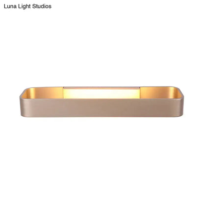Modern minimalist black and white rectangular wall lamp with sleek gold metal frame and warm led lighting for bedroom use
