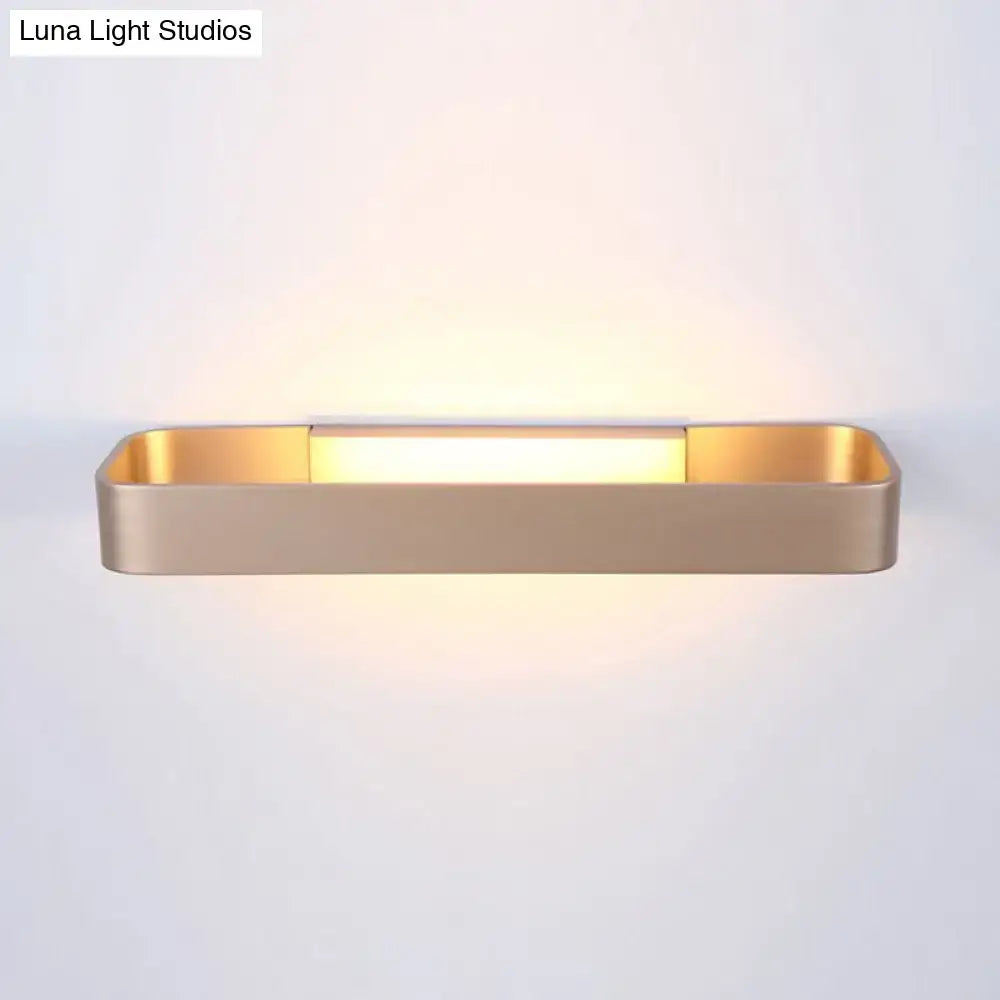 Gold-finished modern minimalist rectangular wall lamp with sleek design for bedroom lighting
