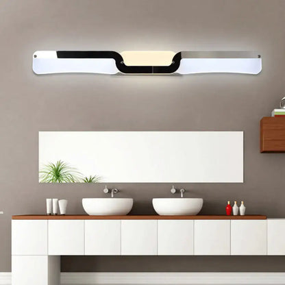 Modern minimalist black and white vanity sconce light with sleek panels and warm white illumination maximum bulb wattage included