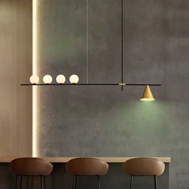 Modern minimalist brass and glass chandelier pendant light with four frosted glass bulbs and conical brass shade