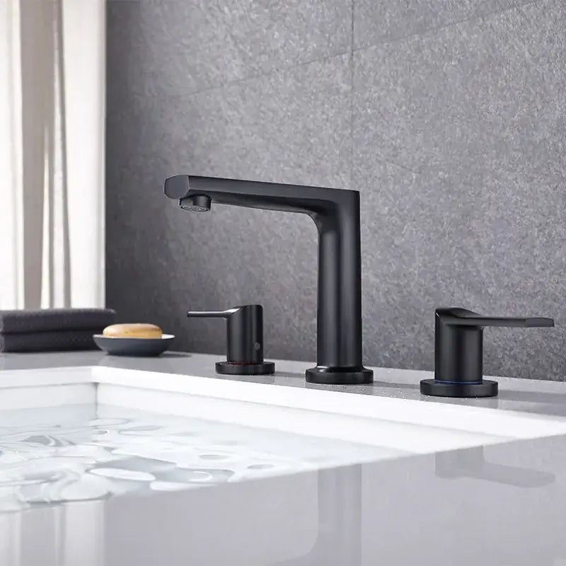 Modern matte black three-handle basin faucet with sleek minimalist design complementing decorbites brush gold widespread style