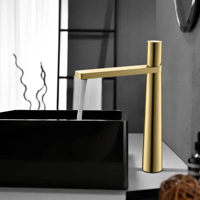 Modern minimalist brushed gold basin faucet with sleek cylindrical spout in decorbites brushed gold finish