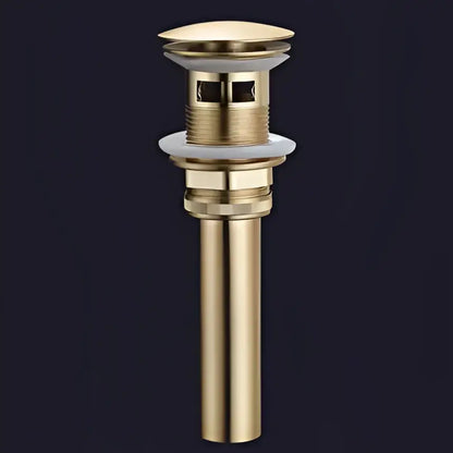 Gold-colored metal drain stopper with textured ridges for decorbites brushed gold brass basin bathroom fixture
