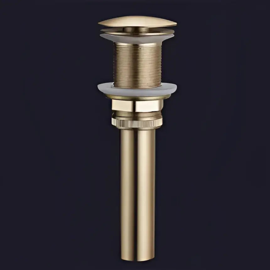 Modern minimalist brushed gold brass widespread bathroom faucet drain stopper with textured ribbed gold brass widespread body