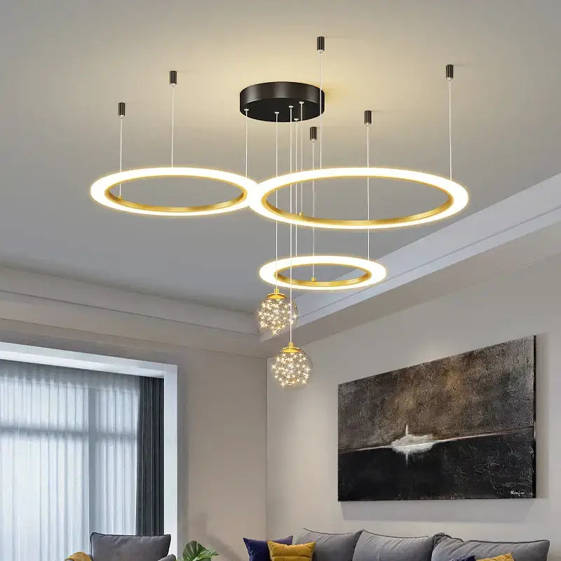 Modern minimalist decorbites circle ring pendant light in gold tone with black mount and crystal globe bedroom chandelier