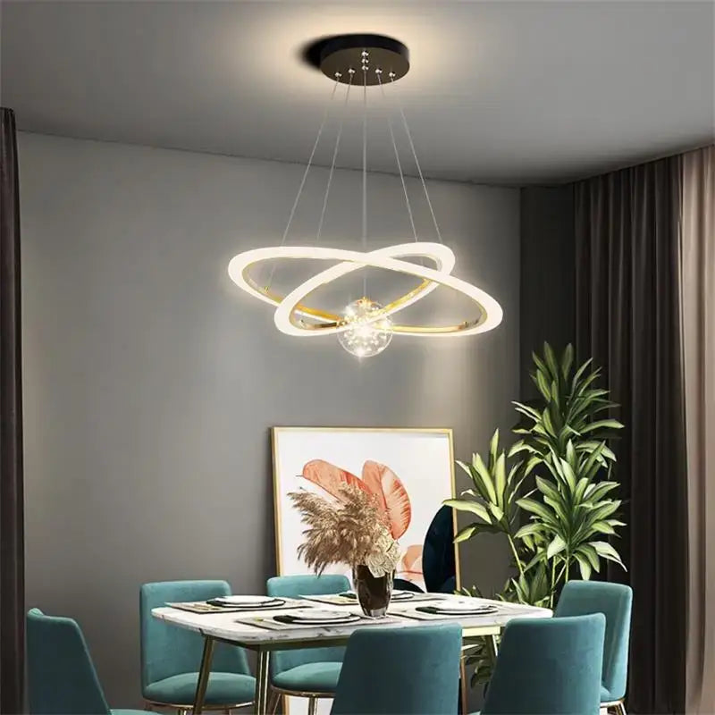 Modern minimalist decorbites circle ring pendant light with two white interlocking rings and a crystal bedroom chandelier