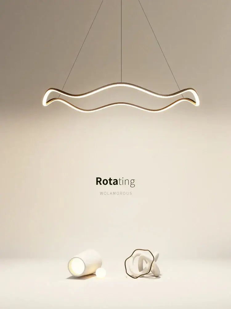Modern minimalist circle wave led pendant chandelier with sleek wave design and warm led illumination for dining room decorbites circle wave