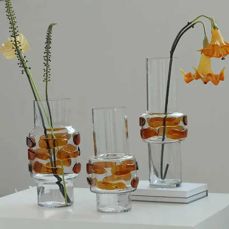 Modern minimalist clear glass vase bubble with amber fused glass accents on white surface for decorbites clear glass decor