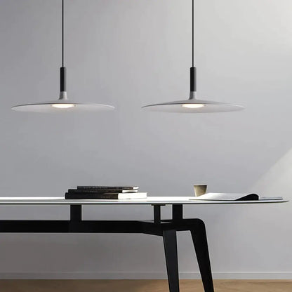 Minimalist white decorbites colorful ufo pendant lights with sleek black cords for modern dining room decor