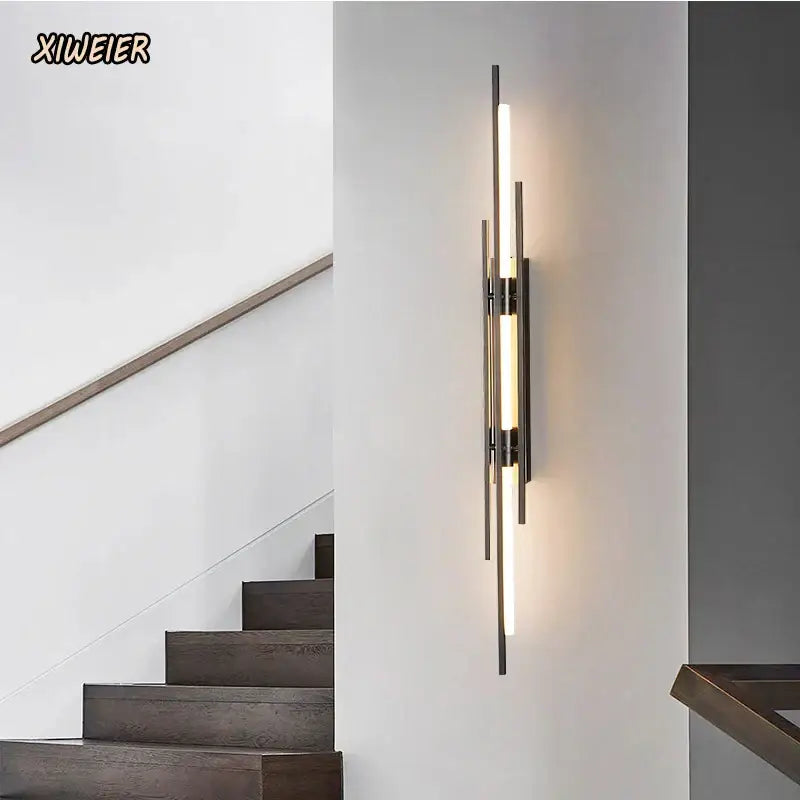 Modern minimalist copper wall lamp with slender metallic rods and warm illuminated tube ideal for bedroom decorbites wall lamp