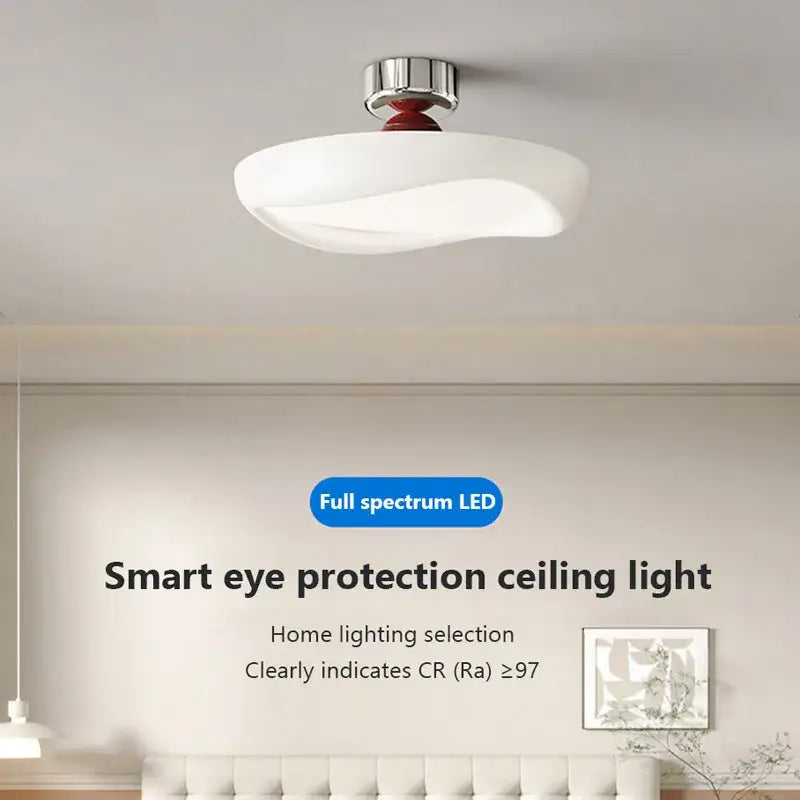 Modern minimalist cream led ceiling light with sleek curved design and chrome-finished mounting for bedroom decorbites decor