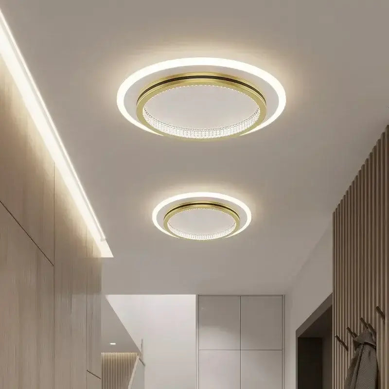 Modern minimalist decorbites crystal led ceiling lights with gold-toned frame and crystal-encrusted ring illumination