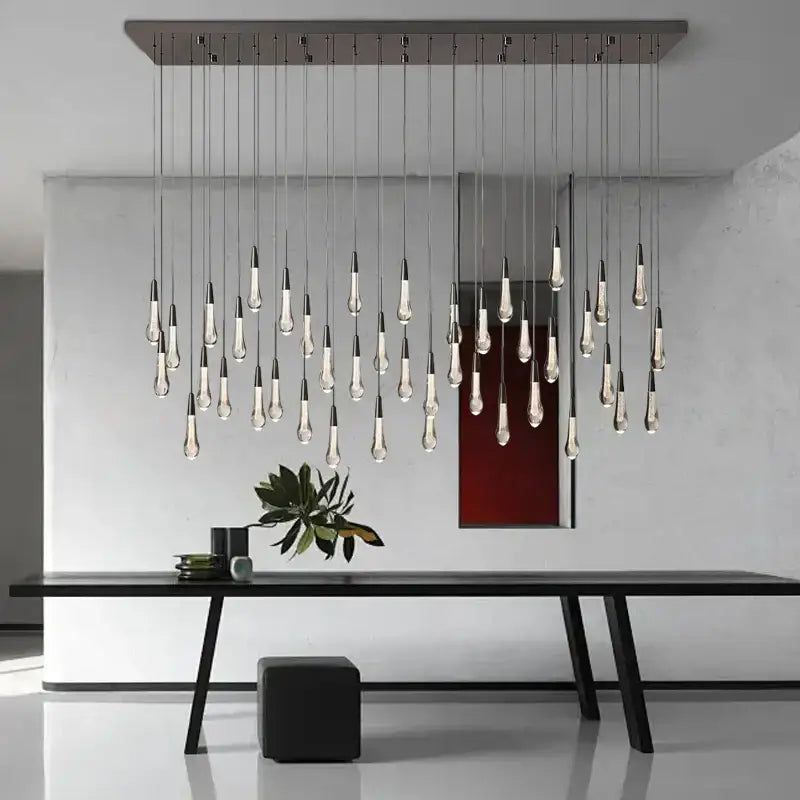 Modern minimalist ceiling chandelier with slender teardrop glass bulbs on metallic frame for dining room decorbites crystal water-drop