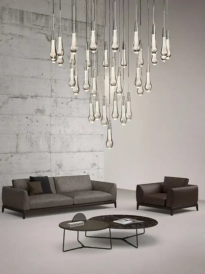 Modern minimalist ceiling chandelier with teardrop-shaped decorbites crystal water-drop glass and sleek metallic finish