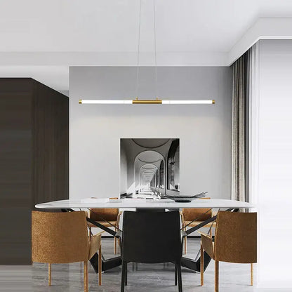 Gold-toned linear dimmable led acryl pendant light with sleek minimalist design for modern dining room decorbites dimmable led