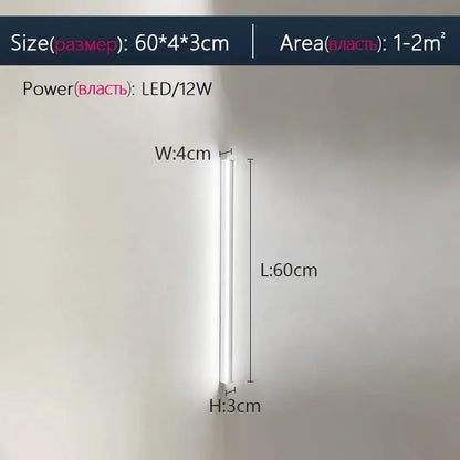 A sleek modern 60cm white led wall lamp with minimalist cylindrical design for decorbites elegant black bedroom decor