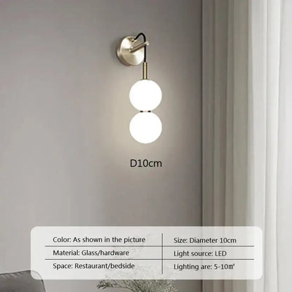 Modern minimalist brass-finished pendant light with two frosted glass ball spheres for living room decorbites glass ball