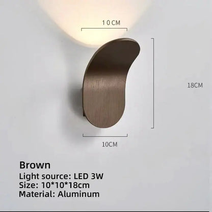 Brown aluminum wall lamps with sleek curved design and 3w led light source for modern minimalist living rooms
