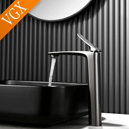 Modern minimalist black basin mixer faucet with tall spout designed for high basin and cold water use