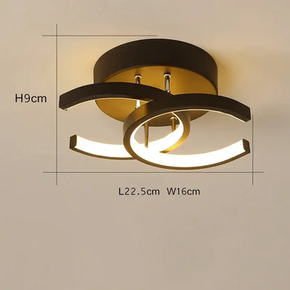 Modern minimalist black and gold decorbites led ceiling light with sleek curved arms for living room decor