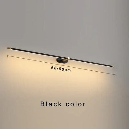 Black minimalist wall-mounted led mirror light with sleek elongated design and gold-toned accents for bathroom use