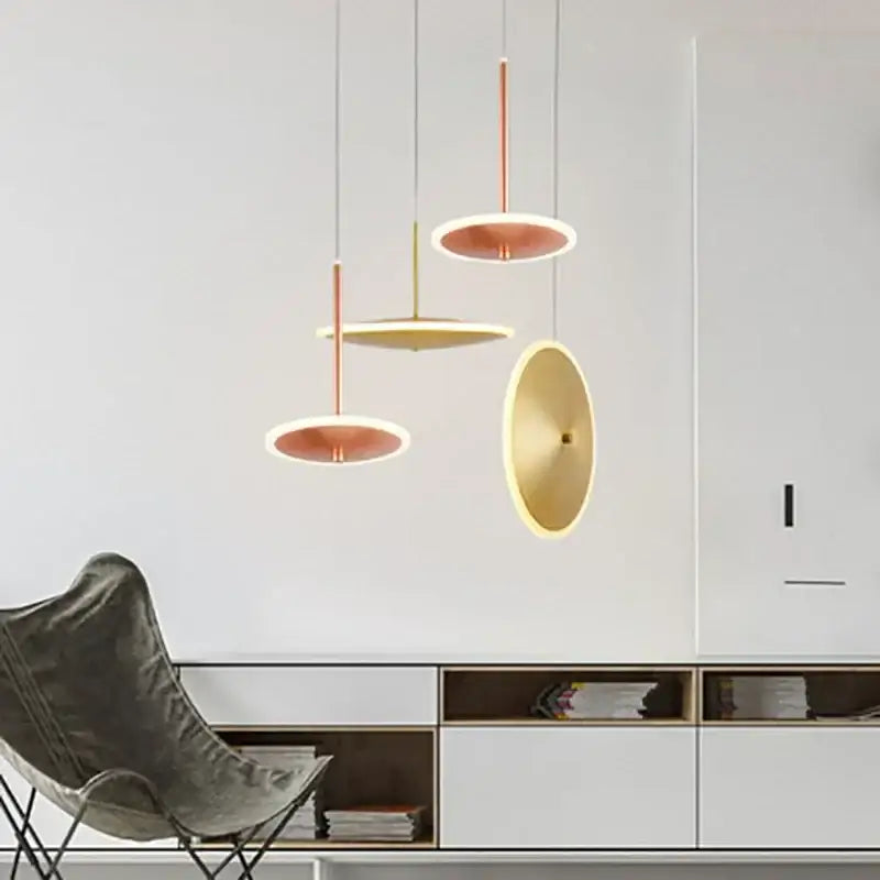 Modern minimalist gold led pendant light with warm copper and gold disc shades for kitchen island decorbites gold led pendant