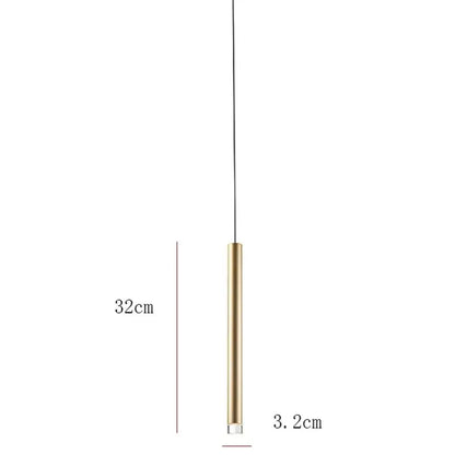 A sleek modern minimalist gold tube led pendant light with a cylindrical brass body and clear glass base for kitchen decor