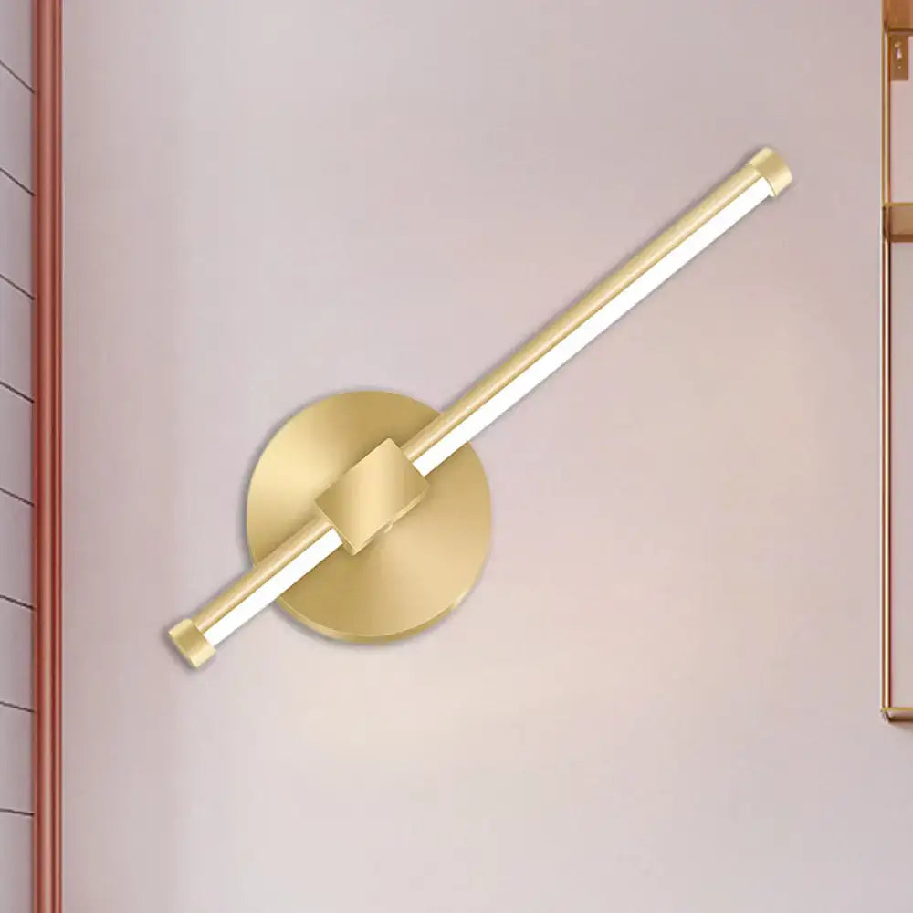 Modern minimalist gold tube stick wall sconce with sleek cylindrical light bar on circular base for bedroom LED lighting