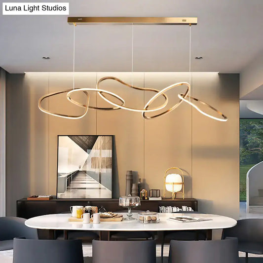 Modern minimalist golden led hanging light featuring gold-toned interlocking rings with a sleek rectangular ceiling mount