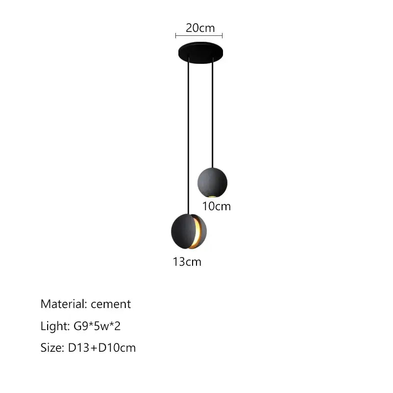Modern minimalist gray and gold pendant light featuring black spherical cement planet chandelier decorbites design