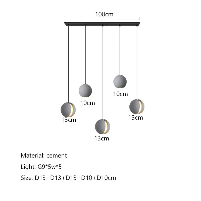 Modern minimalist gray and gold pendant light with five cement spherical shades and black ceiling mount for dining room decorbites cement planet chandelier