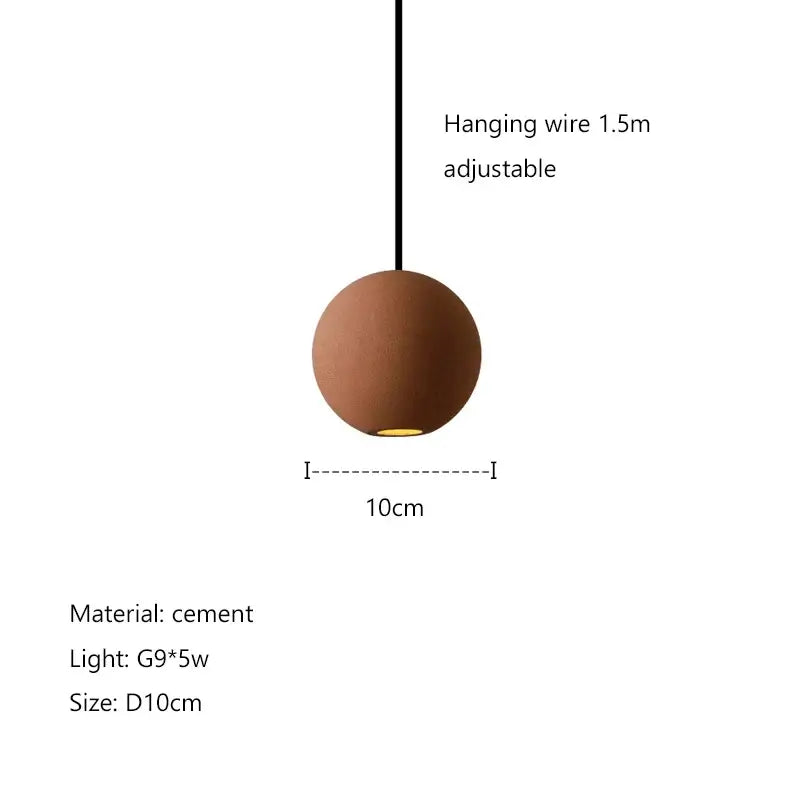Modern minimalist gray and gold pendant light featuring a warm brown decorbites cement planet chandelier with adjustable wire
