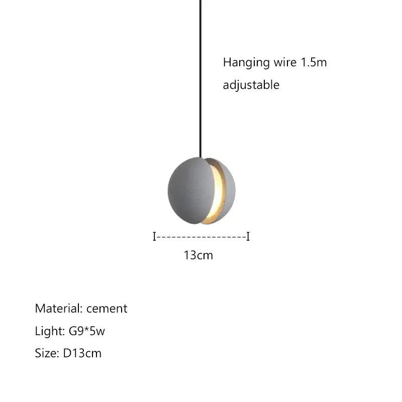 Modern minimalist gray and gold pendant light with matte cement finish and illuminated ring by decorbites cement planet chandelier