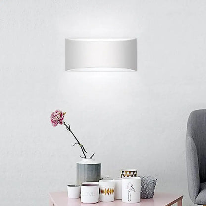 Modern white rectangular wall sconce with sleek minimalist design for bedroom led lighting fixture