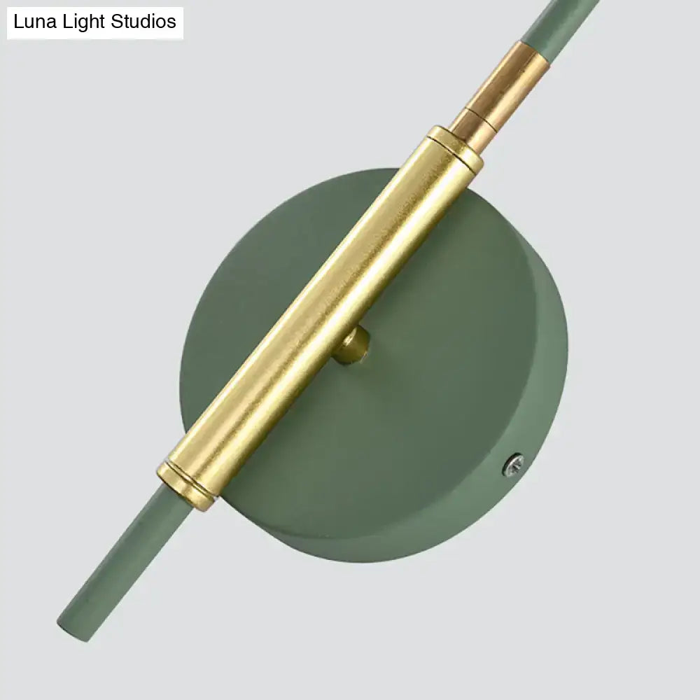 Modern minimalist wall sconce with matte sage green base, polished brass stem, compatible with e27 bulb for bedroom use