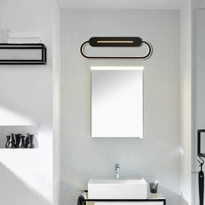 Modern minimalist gray acrylic oval led wall sconce with black and chrome finish for bedroom or bathroom lighting