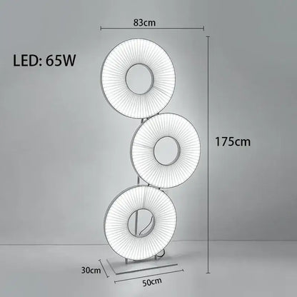 Modern minimalist iris pendant light with three illuminated radial pleated rings emitting bright white light for dining room decor