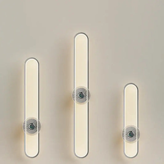 Modern minimalist silver LED strip wall light with sleek frames and warm white circular accents for living room decorbites LED strip