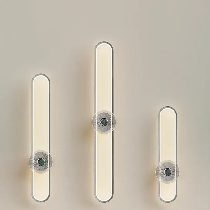 Modern minimalist silver LED strip wall light with sleek frames and warm white circular accents for living room decorbites LED strip
