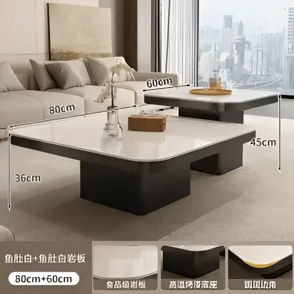Modern minimalist coffee table set with white marble top and black base featuring clean lines for living room