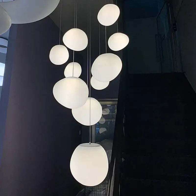 Modern minimalist white cobblestone glass LED pendant light cluster for stairway decorbites pendant light design