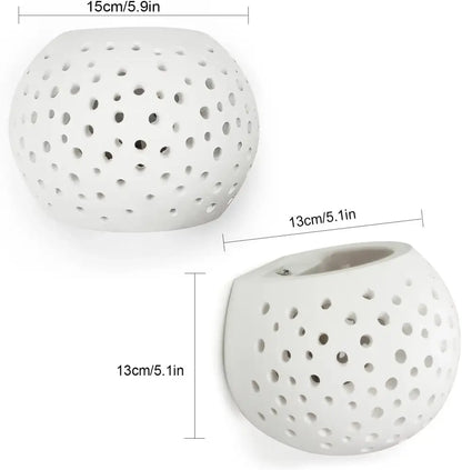 Modern minimalist white gypsum led wall lamp featuring a spherical ceramic diffuser with evenly spaced perforations