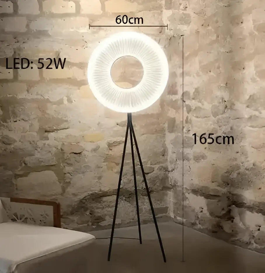 Modern minimalist white led pendant light with circular illuminated ring and black tripod base floor lamp design