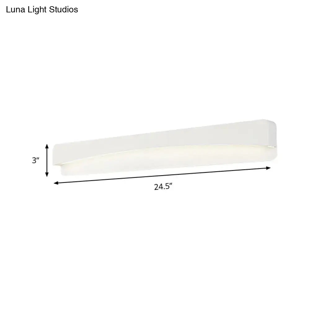 Modern minimalist white rectangular wall sconce lamp with sleek design and soft diffused lighting for bedroom use