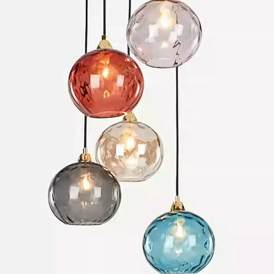 Modern multi color textured glass pendant light with five vibrant spherical globes for dining room use