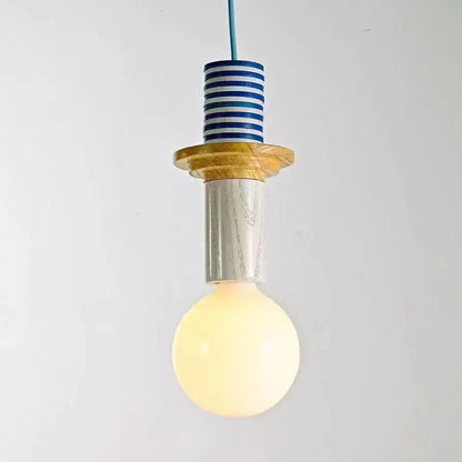 A warm glowing pendant light with iron accent and wood grain stacked cylinders in blue white for kitchen dining room