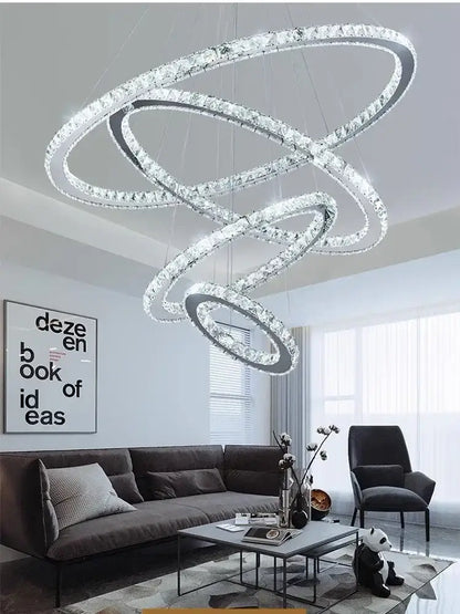 Modern multi tiered chrome rings led chandelier with interlocking crystal rings for elegant living room decorbites lighting