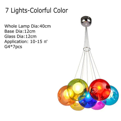 A modern multicolored clear glass chandelier with seven colorful sconces suspended from a chrome ceiling mount