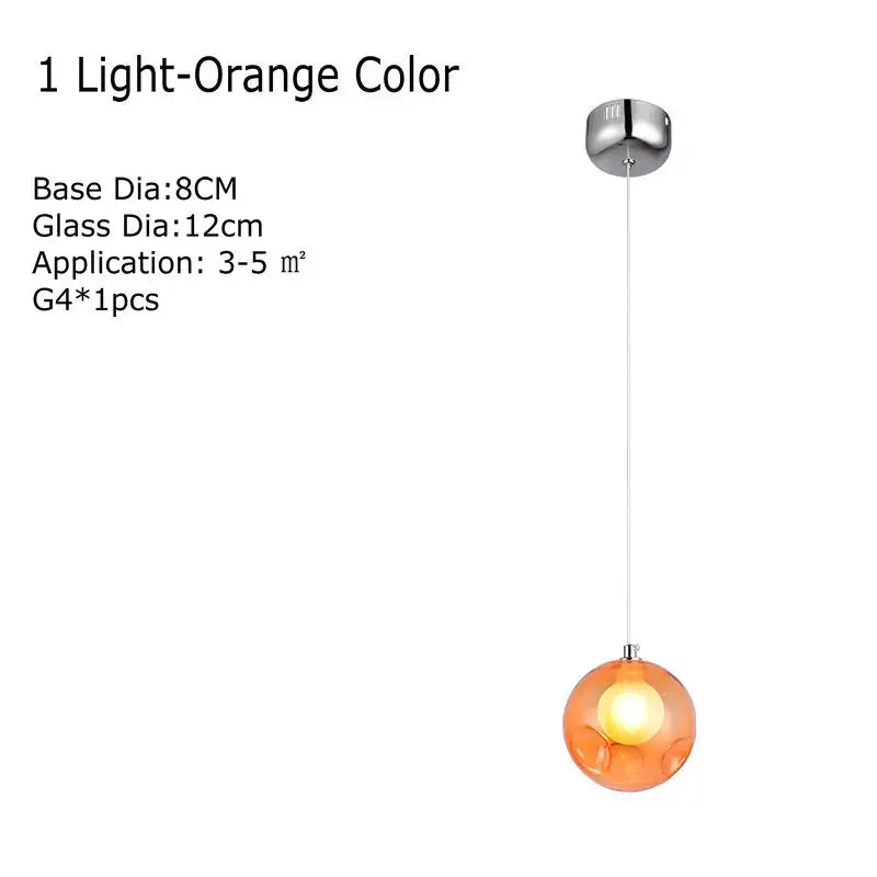 Modern multicolored clear glass chandelier featuring a light-orange spherical pendant light with chrome mount and thin cord